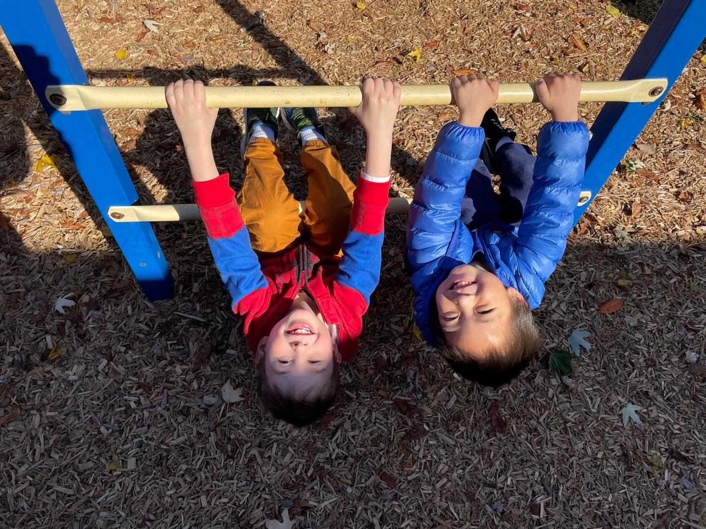 Children exploring Montessori materials in a prepared classroom environment